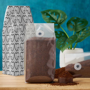 Black hearts on silver pickleball paddle roasted coffee