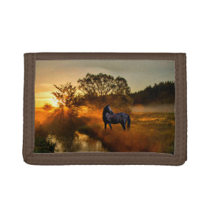 Black horse at sunrise or sunset trifold wallet