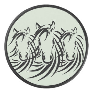 Black Horse Heads on Green Hockey Puck