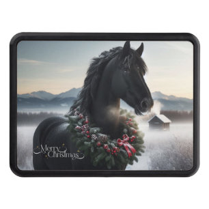 Black horse in the snow with Christmas wreath Hitch Cover