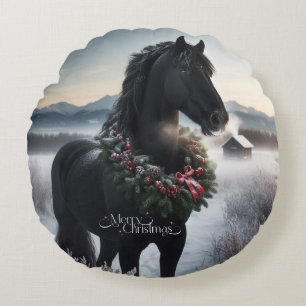 Black horse in the snow with Christmas wreath Round Pillow