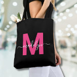Black Hot Pink Modern Script Name Monogram Tote Bag<br><div class="desc">Personalized Elegant Black and Magenta Hot Pink Trendy Modern Script Name Monogram Tote Bag. Add a touch of fun and glamour to your everyday style with this chic tote bag. Featuring a bold magenta hot pink initial centered on a crisp black background, and a clean, modern design on both sides,...</div>