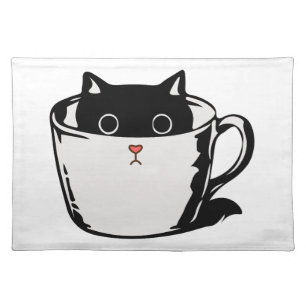 Black kitten with red nose hiding in a cup cloth placemat