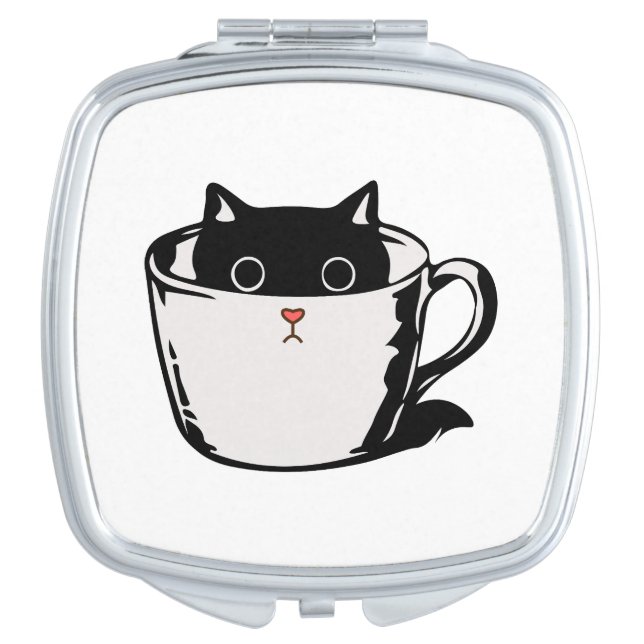 Black kitten with red nose hiding in a cup compact mirror (Front)