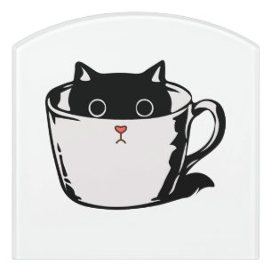 Black kitten with red nose hiding in a cup door sign