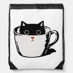 Black kitten with red nose hiding in a cup drawstring bag