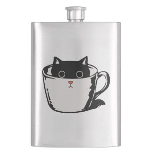 Black kitten with red nose hiding in a cup flask