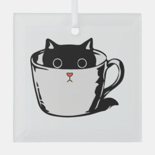 Black kitten with red nose hiding in a cup glass ornament