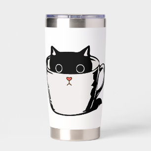 Black kitten with red nose hiding in a cup insulated tumbler