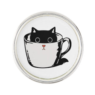 Black kitten with red nose hiding in a cup lapel pin