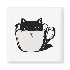 Black kitten with red nose hiding in a cup magnet