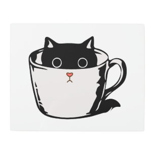 Black kitten with red nose hiding in a cup metal print