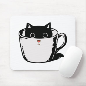 Black kitten with red nose hiding in a cup mouse pad