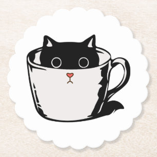 Black kitten with red nose hiding in a cup paper coaster