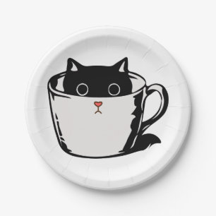Black kitten with red nose hiding in a cup paper plates