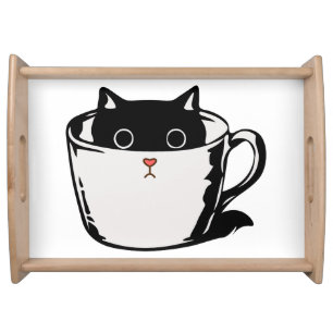 Black kitten with red nose hiding in a cup serving tray