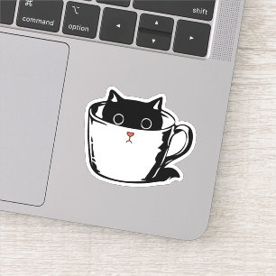 Black kitten with red nose hiding in a cup sticker