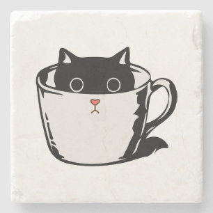 Black kitten with red nose hiding in a cup stone coaster
