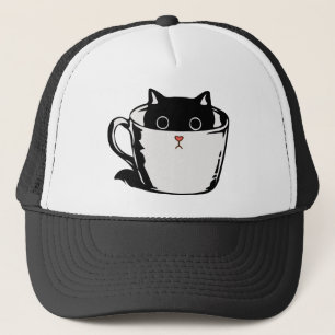 Black kitten with red nose hiding in a cup trucker hat