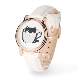 Black kitten with red nose hiding in a cup watch