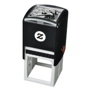 black lab retrieving self-inking stamp