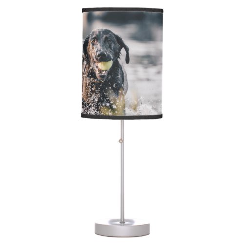 Black Labrador Plays Fetch In Water Table Lamp