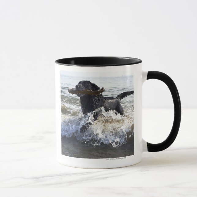 Black Labrador retriever running through surf Mug (Right)