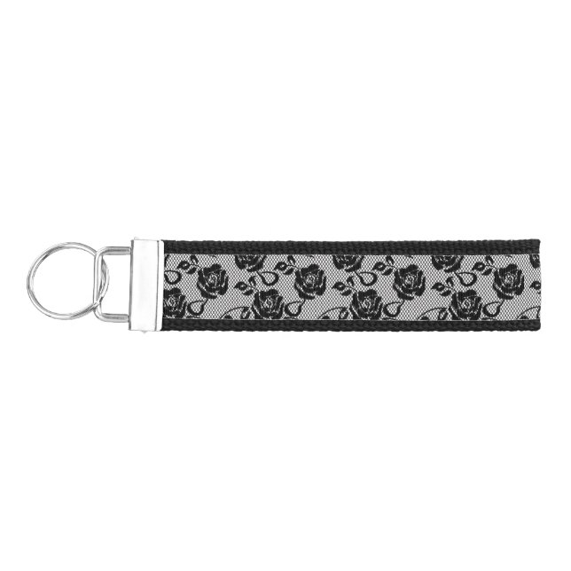 Black lace pattern on white background wrist keychain (Keys on Left)