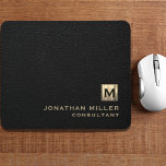 Black Leather Gold Monogram Mouse Pad<br><div class="desc">Add a touch of sophistication to your workspace with this personalized black leather and gold monogram mouse pad. The classic block typography and brushed monogram medallion with your initials make it a perfect accessory for your home or office. The smooth surface and non-slip backing provide optimal mouse performance, making this...</div>