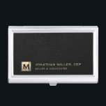 Black Leather Luxury Gold Initial Logo Business Card Case<br><div class="desc">Simple modern luxury design with brushed metallic gold initial logo medallion with personalized name,  title,  company name or custom text below on a black leather textured background. Personalize for your custom use.</div>