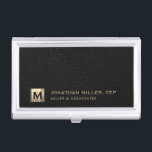 Black Leather Luxury Gold Initial Logo Business Card Case<br><div class="desc">Simple modern luxury design with brushed metallic gold initial logo medallion with personalized name,  title,  company name or custom text below on a black leather textured background. Personalize for your custom use.</div>