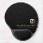 Black Luxury Gold Initial Logo Gel Mouse Pad<br><div class="desc">This modern luxury gel mouse pad is the perfect addition to any office or workspace. The sleek design features a gold initial logo in classic block typography, adding a touch of personalization, on a black leather print background. The gel wrist rest provides comfort and support during long hours of work....</div>