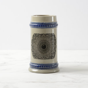 black mandala art on a tall mug