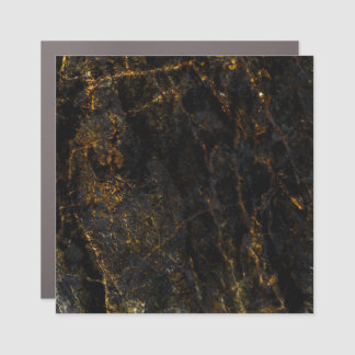 Black marble, golden veins, texture. car magnet