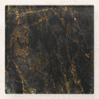 Black marble, golden veins, texture. glass coaster
