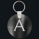 Black Modern Faux Stainless Steel Monogram Keychain<br><div class="desc">Modern and Elegant Black Faux Stainless Steel Metallic Elegant Keychain. These Keychains can be customized to include your initial and first name. These key chains make great birthday,  bridal shower or bachelorette party favors.</div>