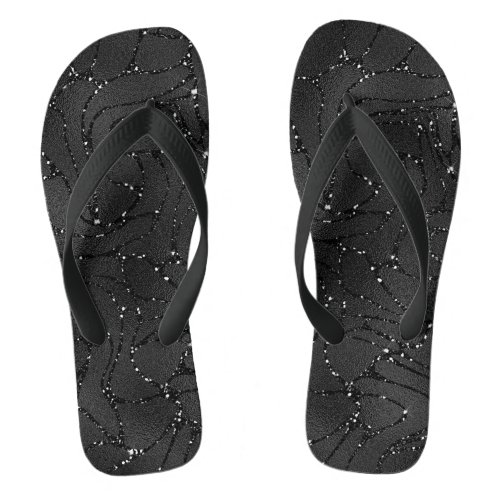 Black monochromatic glittery background flip flops