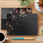 Black Moody Gothic Flowers & Mist Wedding Envelope<br><div class="desc">Unveil the elegance of your gothic romance with our exquisite wedding invitation envelope. Adorned with solemn sprays of faded flowers against a soft black background, each is enveloped in a delicate veil of mist, setting the perfect tone for your timeless love. Make your special day unforgettable with these uniquely enchanting...</div>