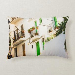 BLACK MOTORCYCLE NEAR WHITE WALL BUILDING AT DAYTI ACCENT PILLOW