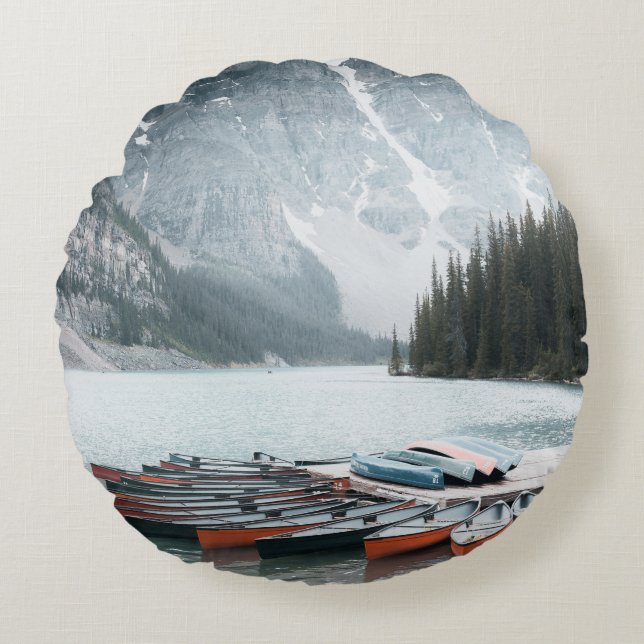 BLACK MOUNTAIN COVERED WITH SNOW UNDER GREY SKY ROUND PILLOW (Front)