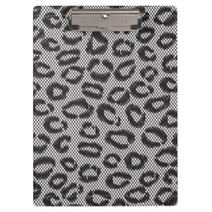 Black net lace with leopard pattern on white clipboard
