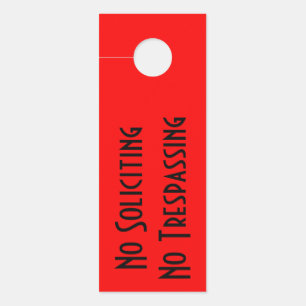 Black "No Soliciting No Trespassing" on Red Door Hanger