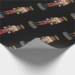 Black Nutcracker Red Soldier Christmas  Wrapping Paper<br><div class="desc">Make your presents stand out under the tree with our premium Black Nutcracker Red Soldier Christmas Wrapping Paper. The striking design,  showcasing handsome nutcracker soldiers in colorful uniform against a dramatic black backdrop,  adds a festive and stylish touch to your holiday gifts.</div>