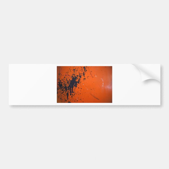 Black paint splatter on orange bumper sticker (Front)
