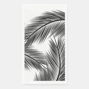 Black palm leaves on white background paper guest towels