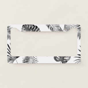 Black palm leaves: vintage seamless. license plate frame