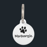 Black Paw Print Pet ID Tag<br><div class="desc">This simply designed pet ID tag will help get your beloved pet back to you where they belong. By having an identification tag on your dog, anyone who finds them will be able to contact you immediately. If they are picked up by your local animal control or humane society, the...</div>
