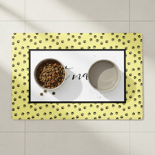 Black pawprints with custom color background placemat