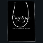 Black Personalized Bridesmaid Bridal Shower Medium Gift Bag<br><div class="desc">Give thank your bridesmaids,  flower girls,  maid of honor and other bridal parties using this customizable gift bag. It features black background color with white modern calligraphy.</div>