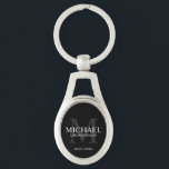 Black Personalized Groomsmen's name and monogram Keychain<br><div class="desc">Add a personal touch to your wedding with personalized groomsmen keychain. This keychain features personalized groomsman's name with title and wedding date in white and monogram in grey as background, in classic serif font style, on black background. Also perfect for best man, father of the bride, ring bearer and more....</div>
